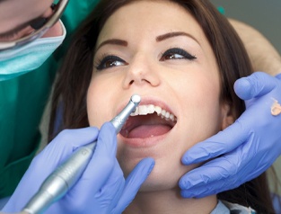 woman at dental cleaning