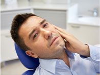man in dental pain
