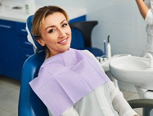 Woman smiling during routine dental checkup in Greenfield