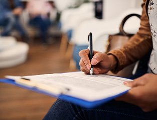 Smiling man with watermelon