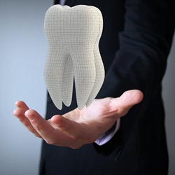 large tooth in hand