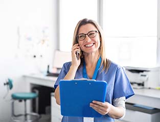 dentist on the phone with patient 