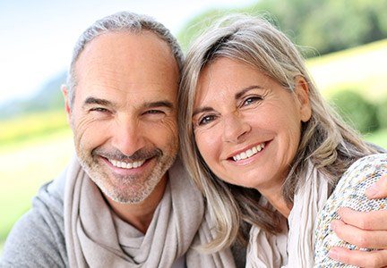 An older couple smiling