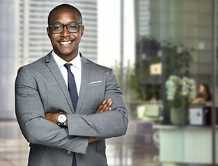 A businessman folding his arms