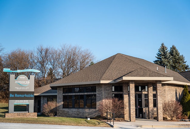 Outside Photo of Building and Sign