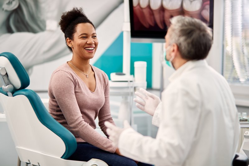 Woman talking to her dentist during an appointment