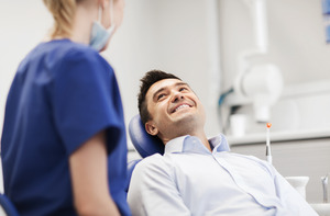 Patient talking to a dentist